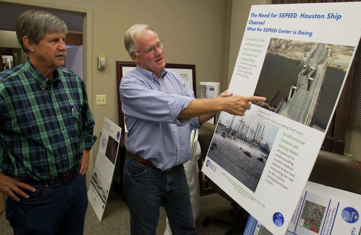 Jim Blackburn and Phil Bedient showed diagrams demonstrating a Rice University storm protection plan on Thursday, Sept. 27, 2012, in Houston.