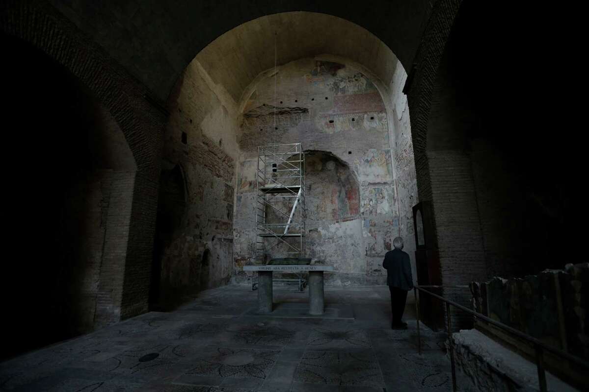 A view of the frescoes painted on the wall of the Ancient Church of St. Mary in the Roman forum, Monday, Oct. 1, 2012. Italy's Ministry of Culture allowed media in Monday for a preview of a massive restoration of what experts call the Sistine Chapel of the VIII century, a series of medieval byzantine frescoes painted on the walls of this church over the course of three centuries. The Ancient Church of St. Mary was founded in the sixth century, in between imperial roman palaces. It was the oldest and most important Christian monument in the Roman forum. (AP Photo/Alessandra Tarantino)