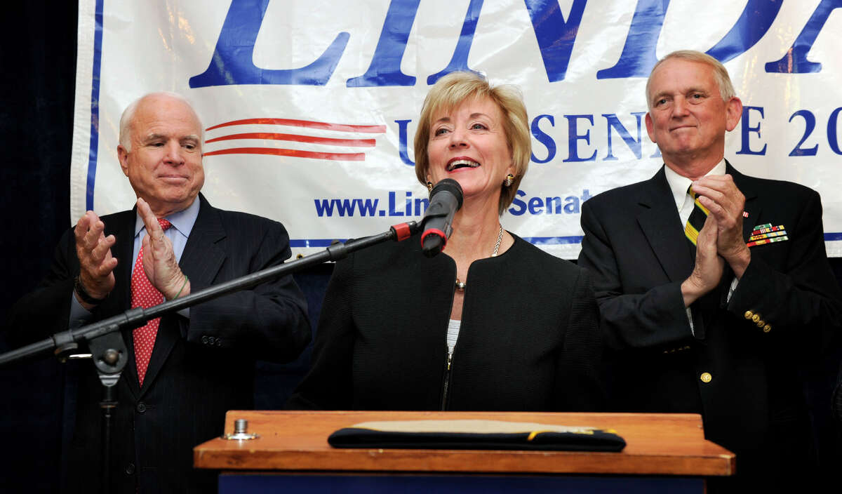 U.S. Senator and former presidential candidate John McCain, left, was in Danbury Monday to announce his support of Linda McMahon who is running for the U.S. senate. Right is former U.S. Congressman Rob Simmons. McCain and McMahon held a rally at the Disabled American Veterans Hall on Segar Street in Danbury, Monday, Oct. 1, 2012.