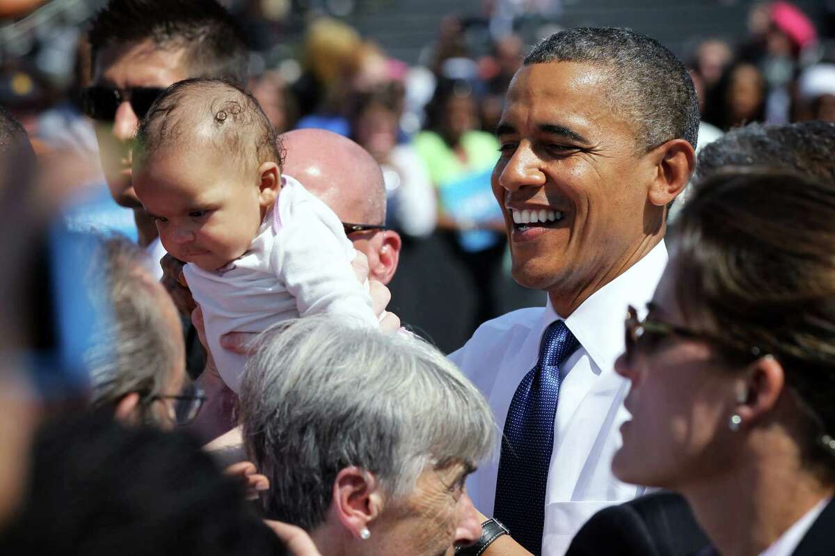 Politicians still love kissing babies