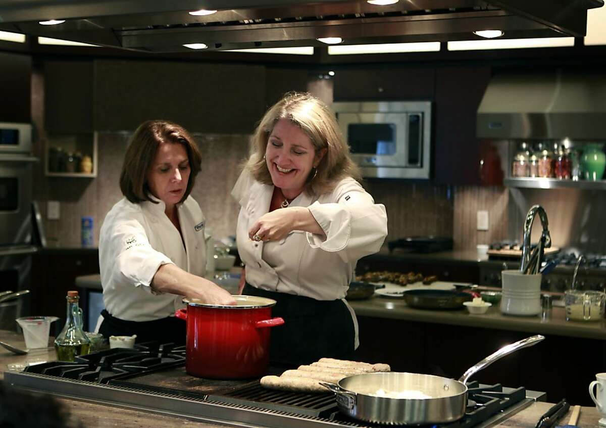 Susan Shenk (left) and Kathryn Regalia prepare a pot of corn chowder during a Fall cooking demonstration at the Viking kitchen appliance showroom in Hayward, Calif. on Saturday, Sept. 15, 2012.