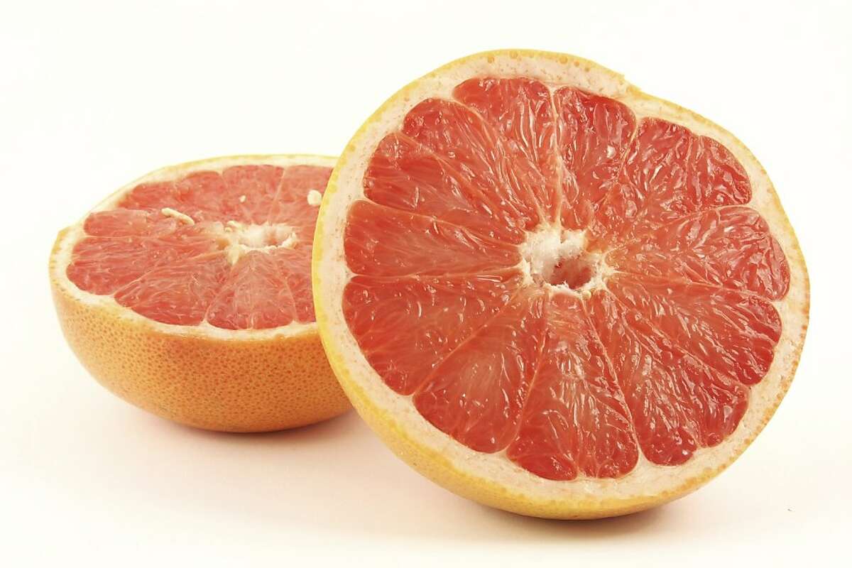 Grapefruit halves isolated on the white background