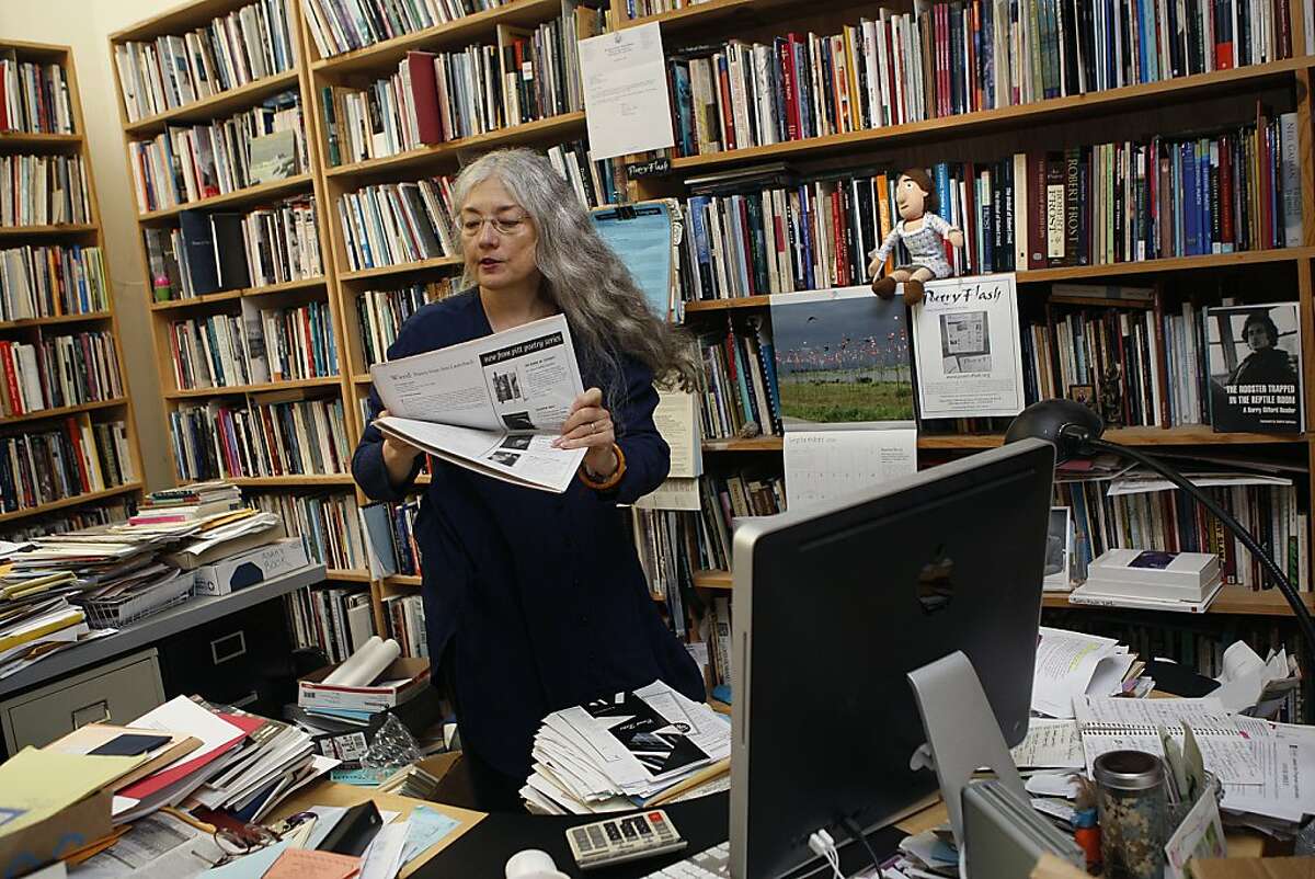 Director Joyce Jenkins looking at one of the Poetry Flash magazine issues in the office in Berkeley, Calif., on Thursday, September 27, 2012. About 20,000 are circulated per issue.