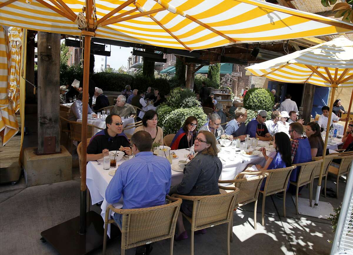 Diners at Angele enjoy eating outdoors on a warm August afternoon. Various popular restaurants in Napa, Calif. including Bistro Don Giovanni, Angele, Morimoto Napa and eating places in the Oxbow Public Market.