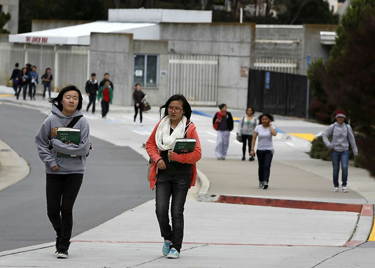 Students walk through the main CCSF campus in San Francisco, Calif. on Friday, June 29, 2012.