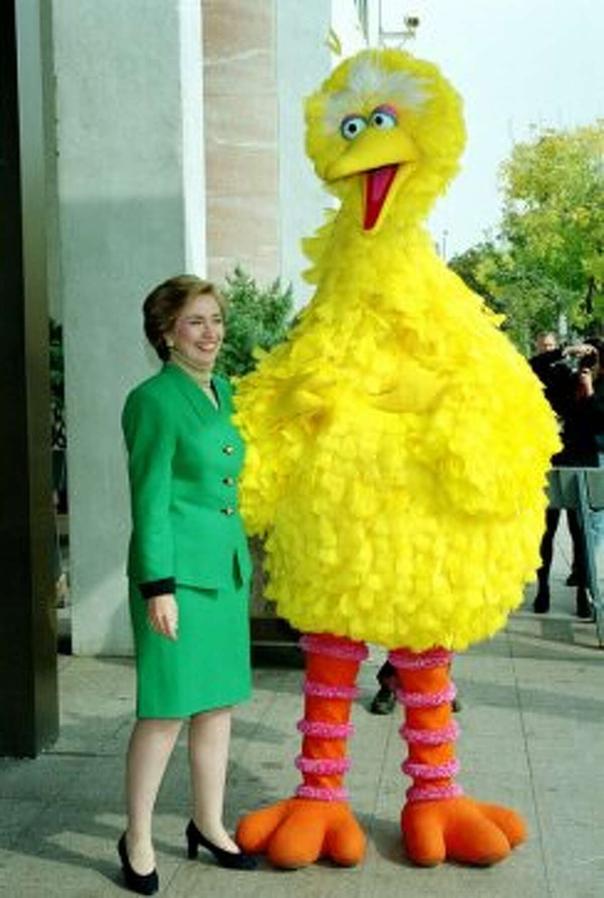 Former First Lady Hillary Clinton poses with Big Bird outside the White House. (AP Photo)