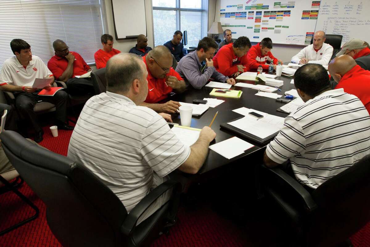 University of Houston head football coach Tony Levine meets with his coaching staff during the morning.