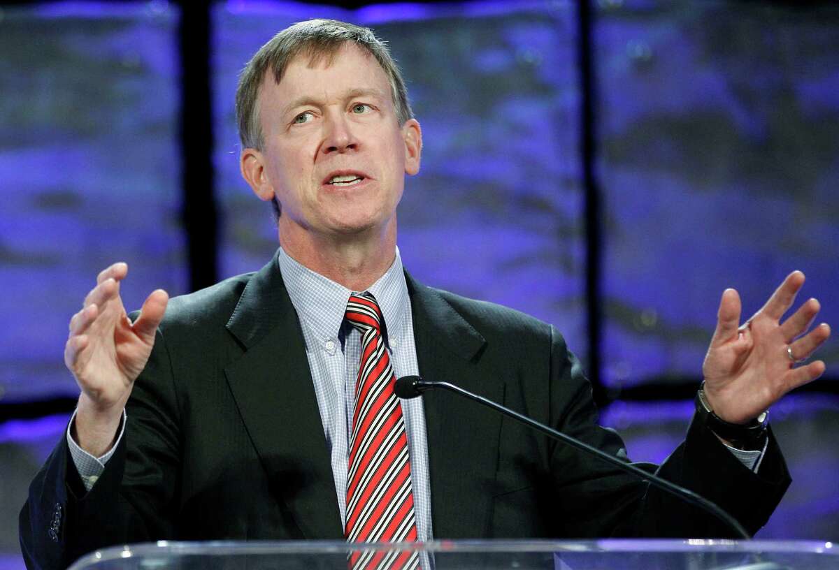 Colorado Gov. John Hickenlooper gestures as he speaks to an energy conference in Oklahoma City, Thursday, Oct. 4, 2012. The governors of Oklahoma and Colorado say their effort to encourage manufacturers to produce compressed natural gas vehicles is gaining momentum. (AP Photo/Sue Ogrocki)