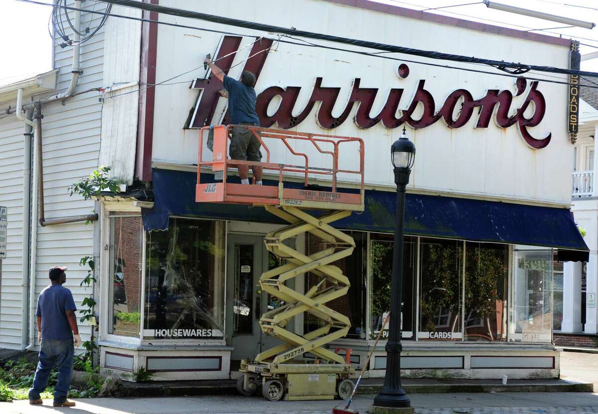Iconic downtown Milford Harrison's Hardware sign comes down