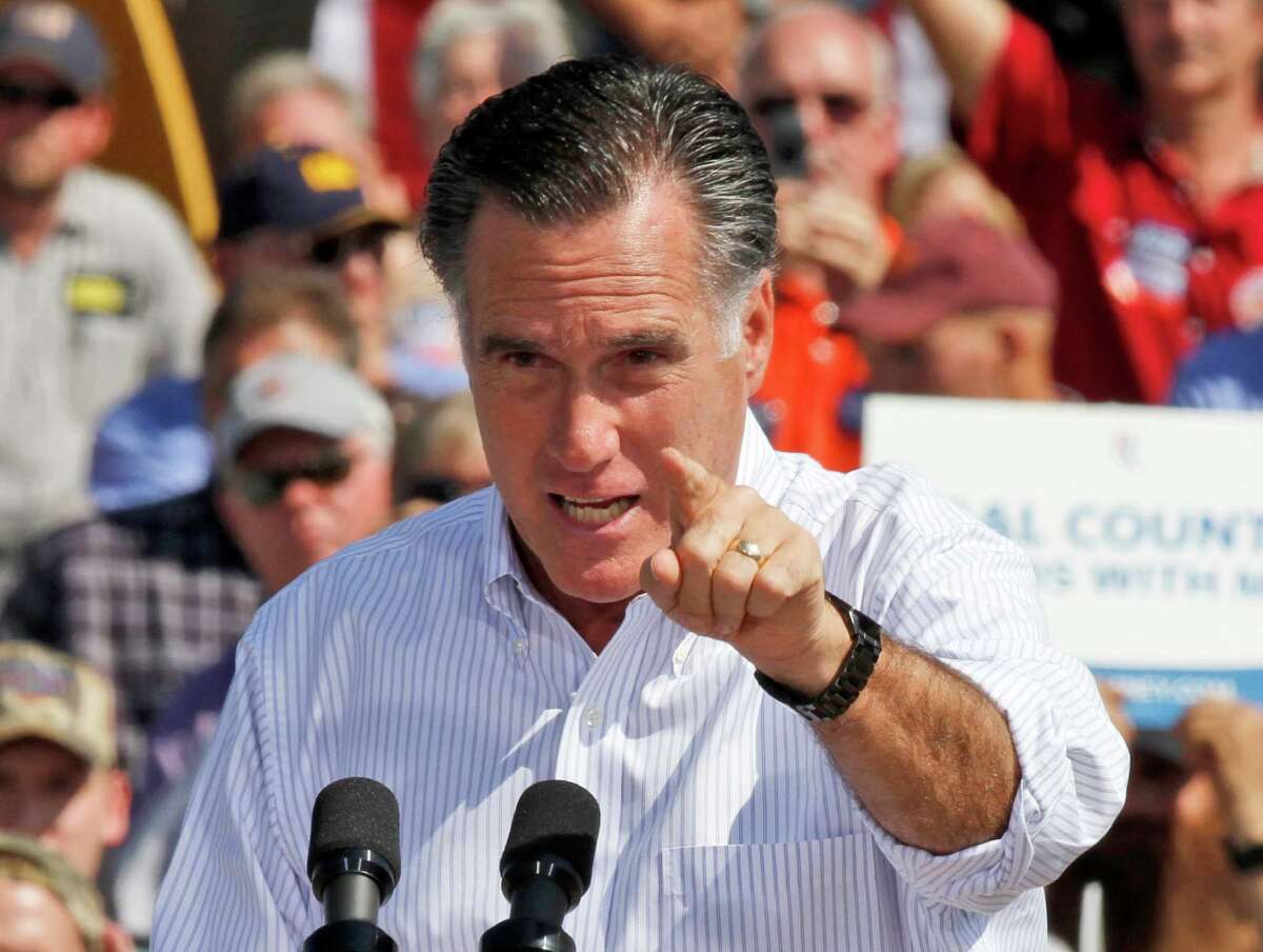 Republican presidential candidate, former Massachusetts Gov. Mitt Romney gestures during a rally in Abingdon, Va., Friday, Oct. 5, 2012.(AP Photo/Steve Helber)