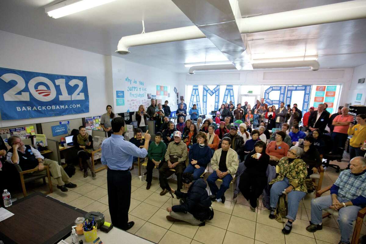 Texas state Rep. Joaquín Castro of San Antonio addresses a crowd of volunteers before canvassing the streets to register people to vote in the Nov. 6 general election, at the Obama for America West office in Denver.