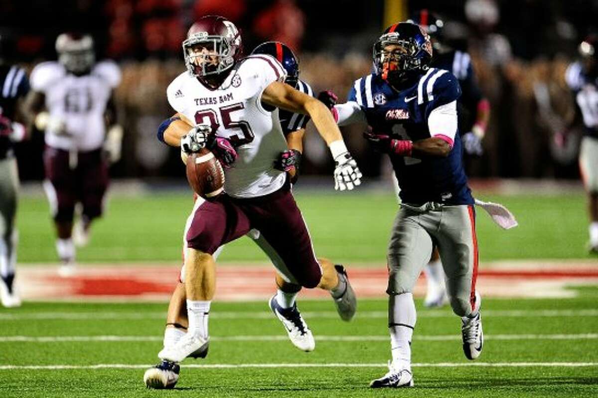 OXFORD, MS - OCTOBER 06: Ryan Swope #25 of the Texas A&M Aggies is stripped of the ball by Cody Prewitt #25 of the Ole Miss Rebels during a game at Vaught-Hemingway Stadium on October 6, 2012 in Oxford, Mississippi. (Photo by Stacy Revere/Getty Images) (Getty Images)