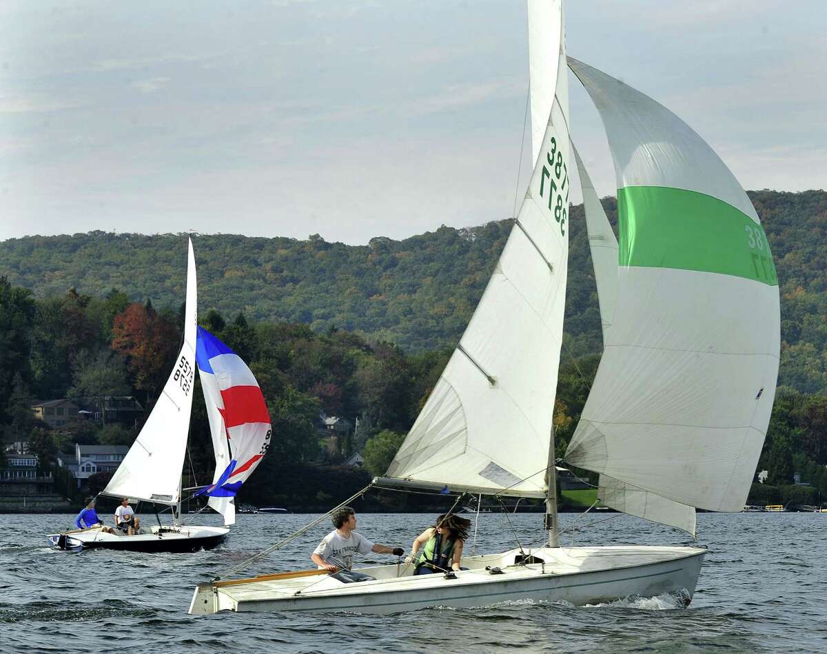 Competitors race Flying Scot sailboats in the Roger Punzi Memorial Regatta, sponsored by the Candlewood Yacht Club, in New Fairfield Saturday, Oct. 6, 2012. Roger Punzi was a member of The club and a sailor of the Flying Scot, a fast 19-foot sailboat.