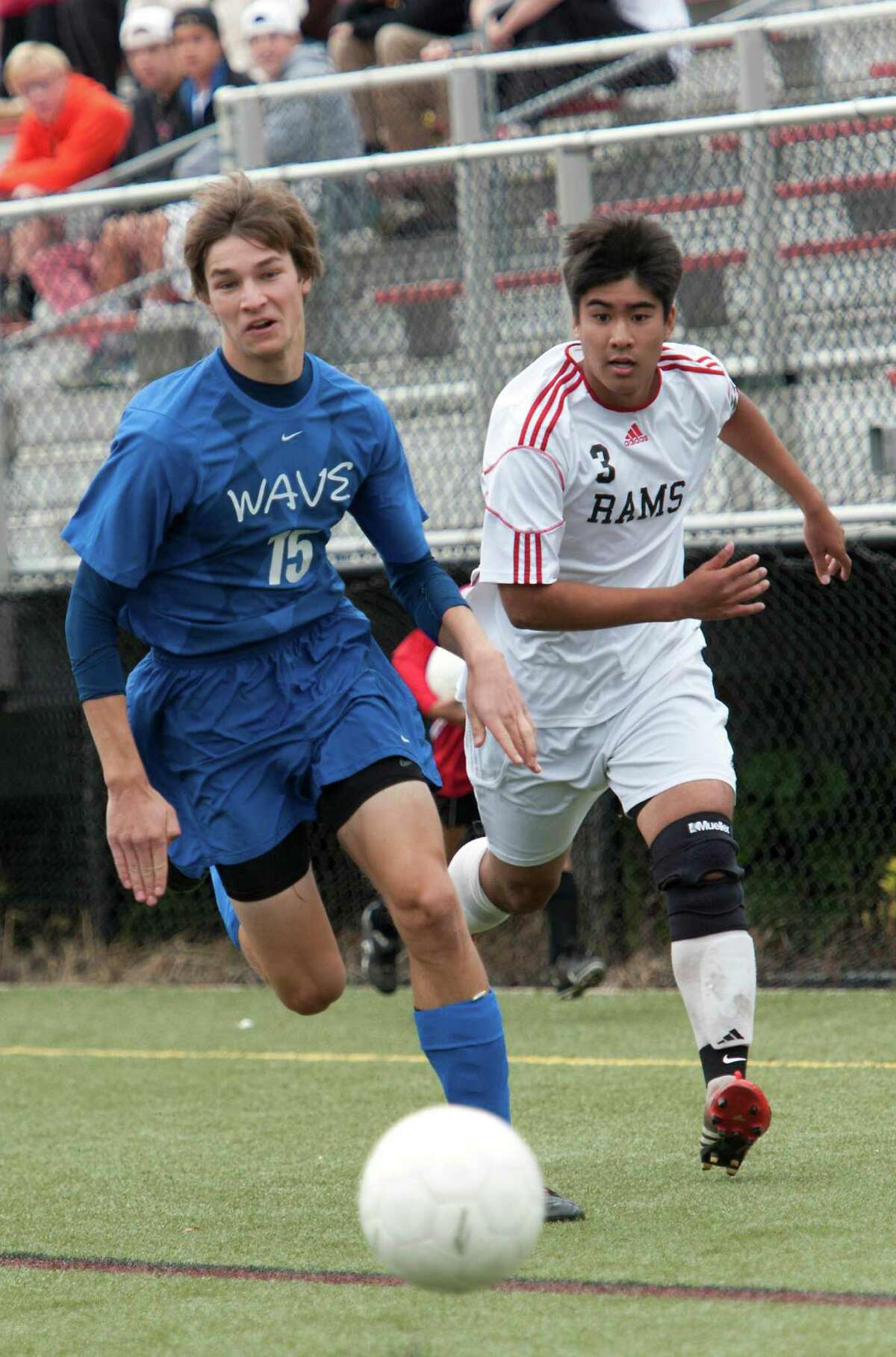 Darien high school's Nick Vilter and New Canaan high school's Justin Pertierra battle for the ball in a boys soccer game held at New Canaan high school, New Canaan, CT Monday October 8th, 2012.