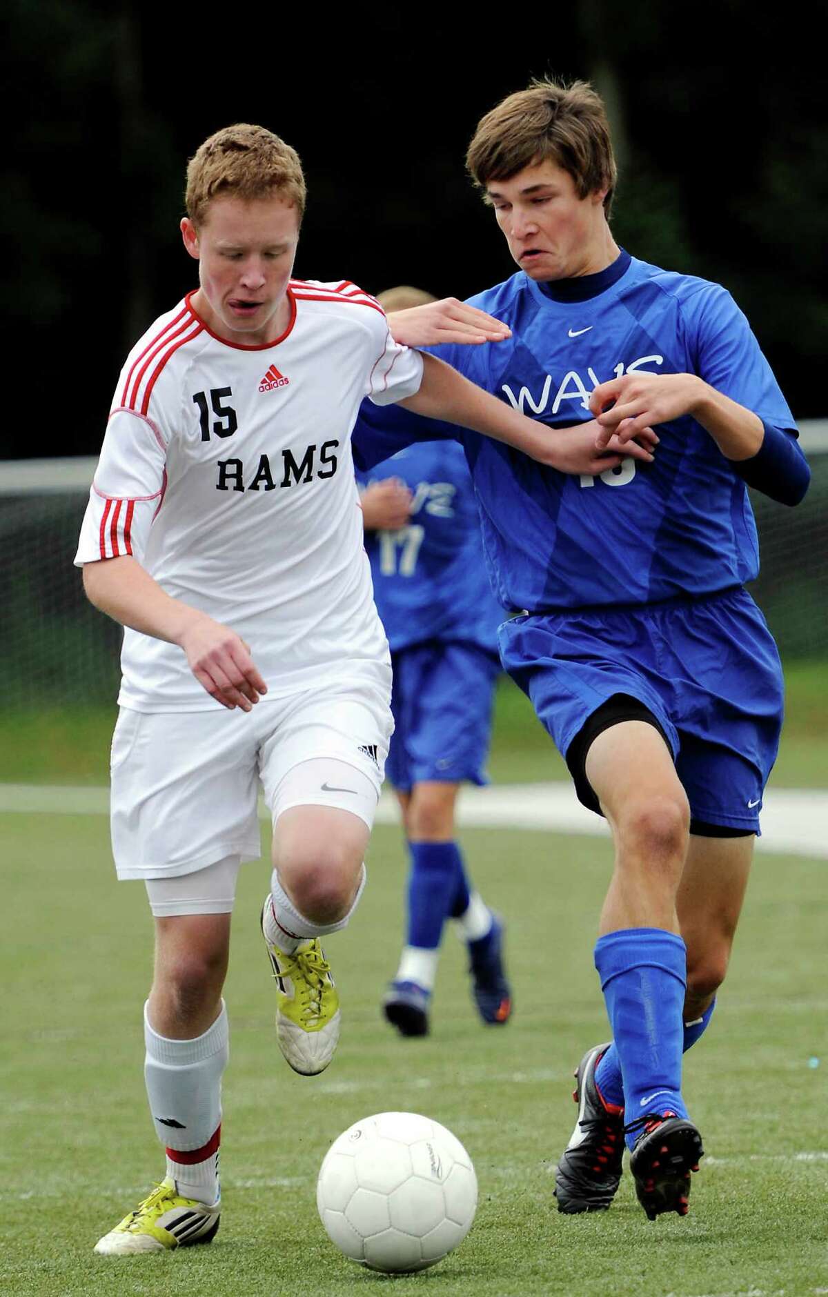 New Canaan high school's Alex Robey and Darien high school's Nick Vilter battle for the ball in a boys soccer game held at New Canaan high school, New Canaan, CT Monday October 8th, 2012.