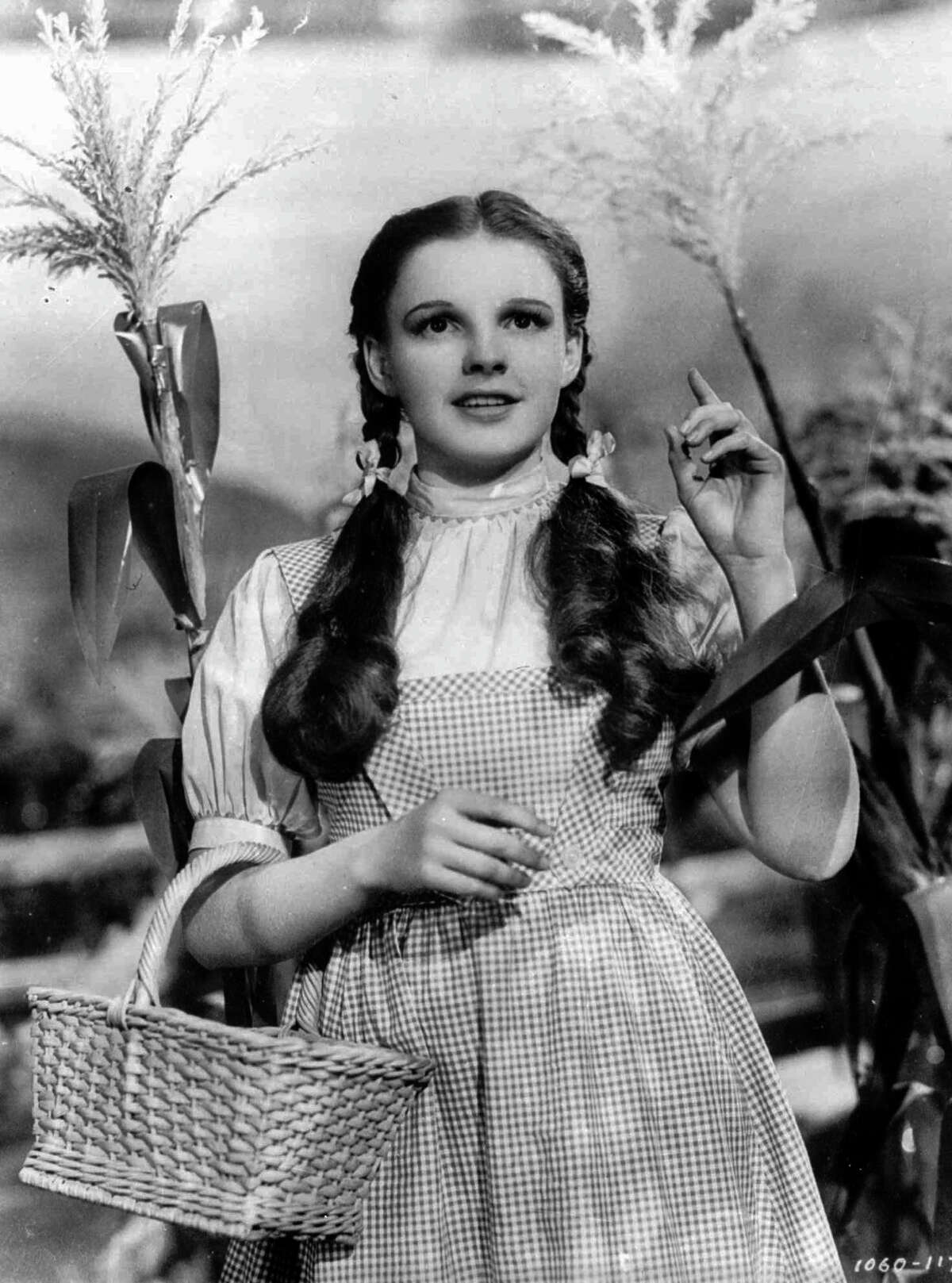 In this 1939 file photo provided by Warner Bros., Judy Garland portrays Dor...