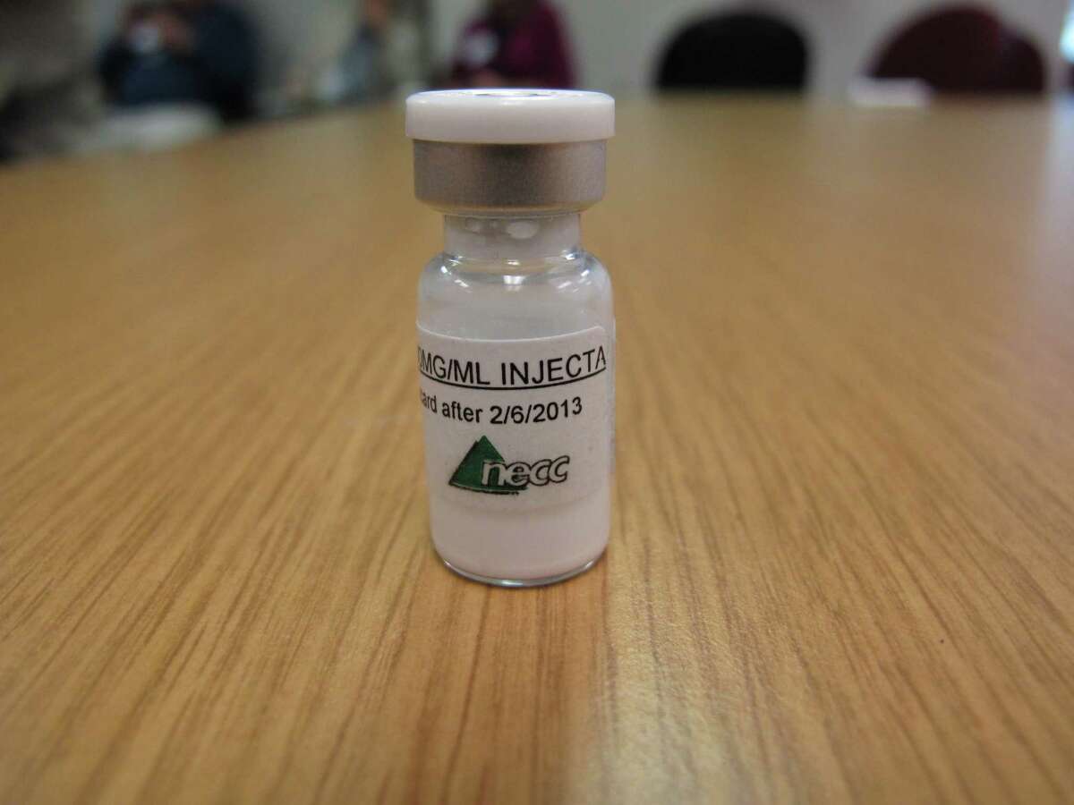A vial of injectable steroids from the New England Compounding Center is displayed in the Tennessee Department of Health in Nashville, Tenn., on Monday, Oct. 8, 2012. The CDC has said an outbreak of fungal meningitis may have been caused by steroids from the Massachusetts specialty pharmacy. (AP Photo/Kristin M. Hall)