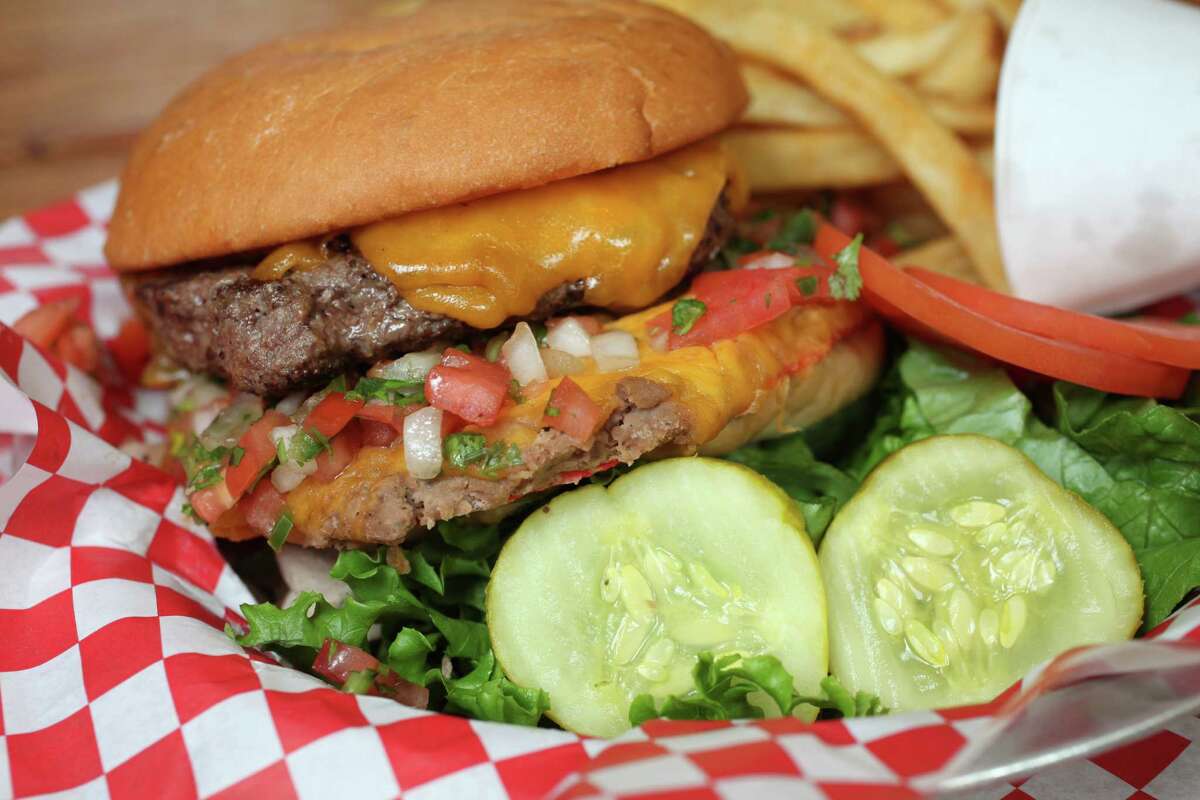 Chalupa Burger at Bigz, The beanburger, a favorite in San Antonio and nearly unknown outside of it, is an underappreciated culinary icon. A burger topped with refried beans, corn chips and cheese, its original incarnation was an ode to the joys of processed food.