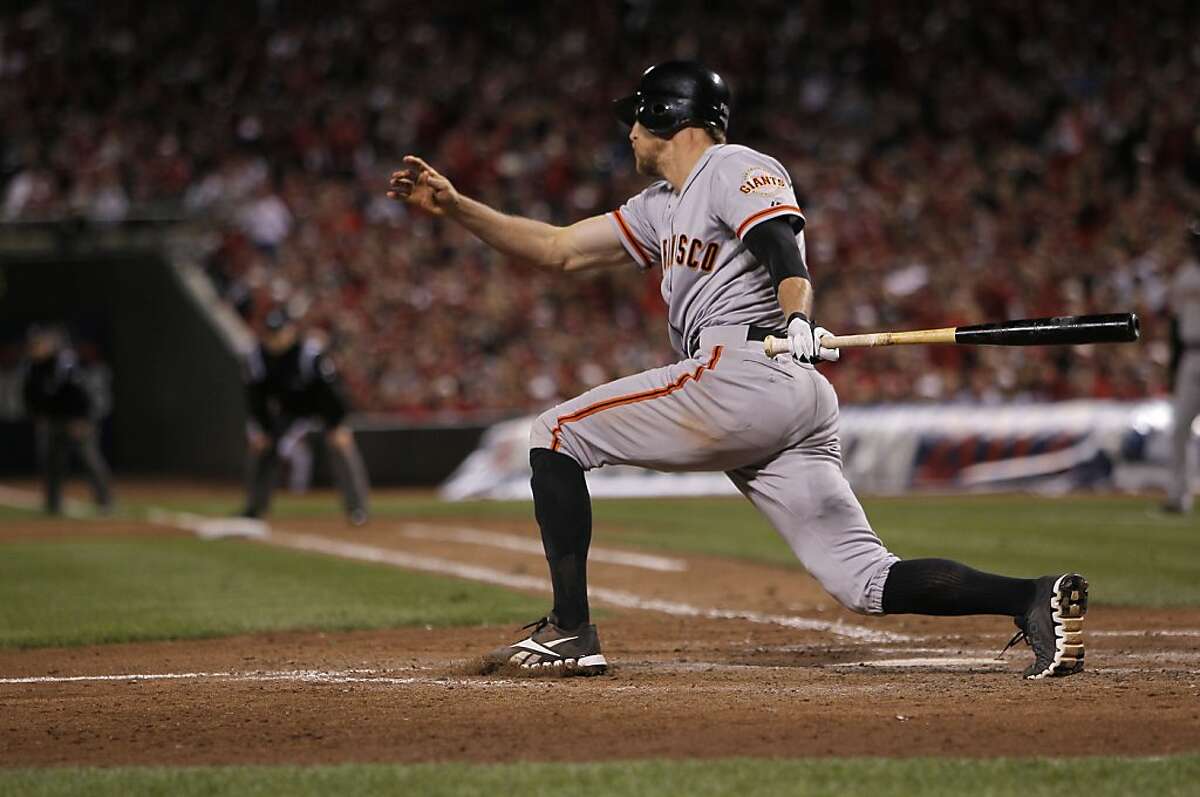 The Giants' Hunter Pence singled in the tenth inning to move teammate Buster Posey to second base, as the San Francisco Giants went on to beat the Cincinnati Reds 2-1, in Game 3 of the National League Division Series in Cincinnati, Ohio on Tuesday Oct. 9, 2012.