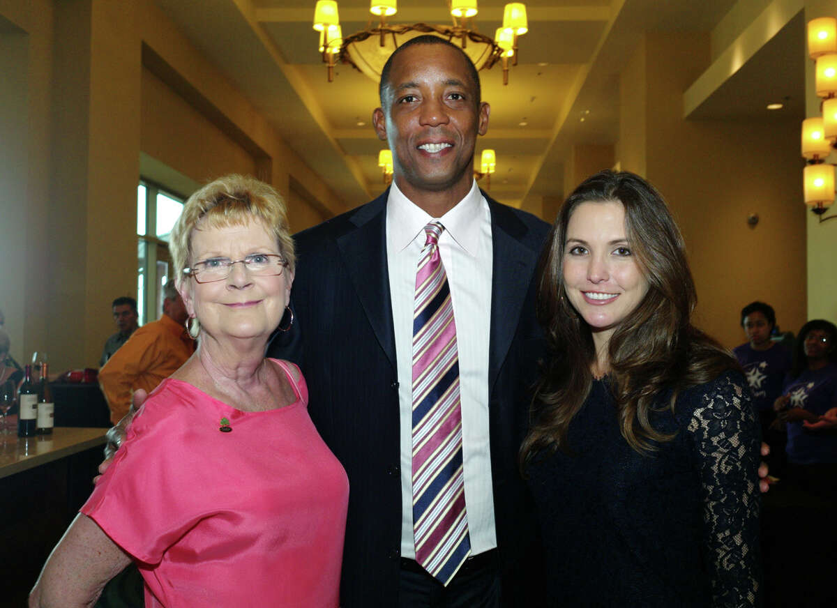 WINGS executive director Terri Jones, from left, and honorary chairs and spouses Sean Elliott and Claudia Zapata Elliott gather at the Women Involved in Nurturing, Giving, Sharing, Inc. gala at the JW Marriott Hill Country Resort on 9/29/2012. names checked photo by leland a. outz