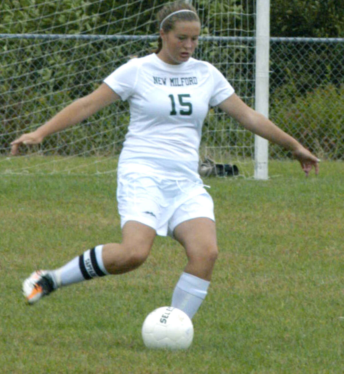 Green Wave defensive stalwart Madison Ranno clears the balll from the zone during New Milford High School girls' soccer's Sept. 22, 2012 match vs. Kolbe Cathedral at NMHS.