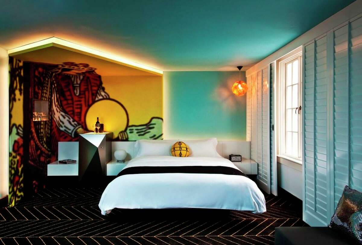 A "Tarot" room at W French Quarter in New Orleans which has completed at $9 million property renovation, updating the look and design of all 97 guest rooms.