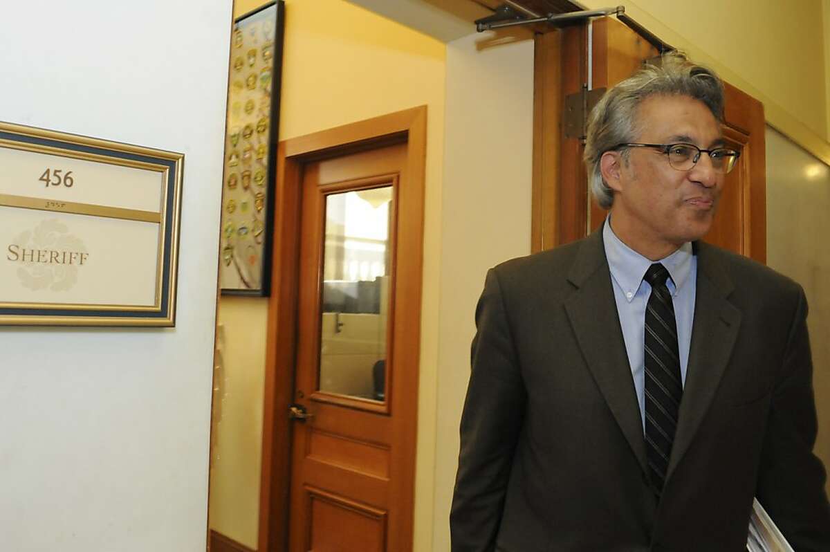 Sheriff Ross Mirkarimi leaves his office Wednesday, Oct. 10, 2012, a day after he was reinstated to his position by the board of supervisors.