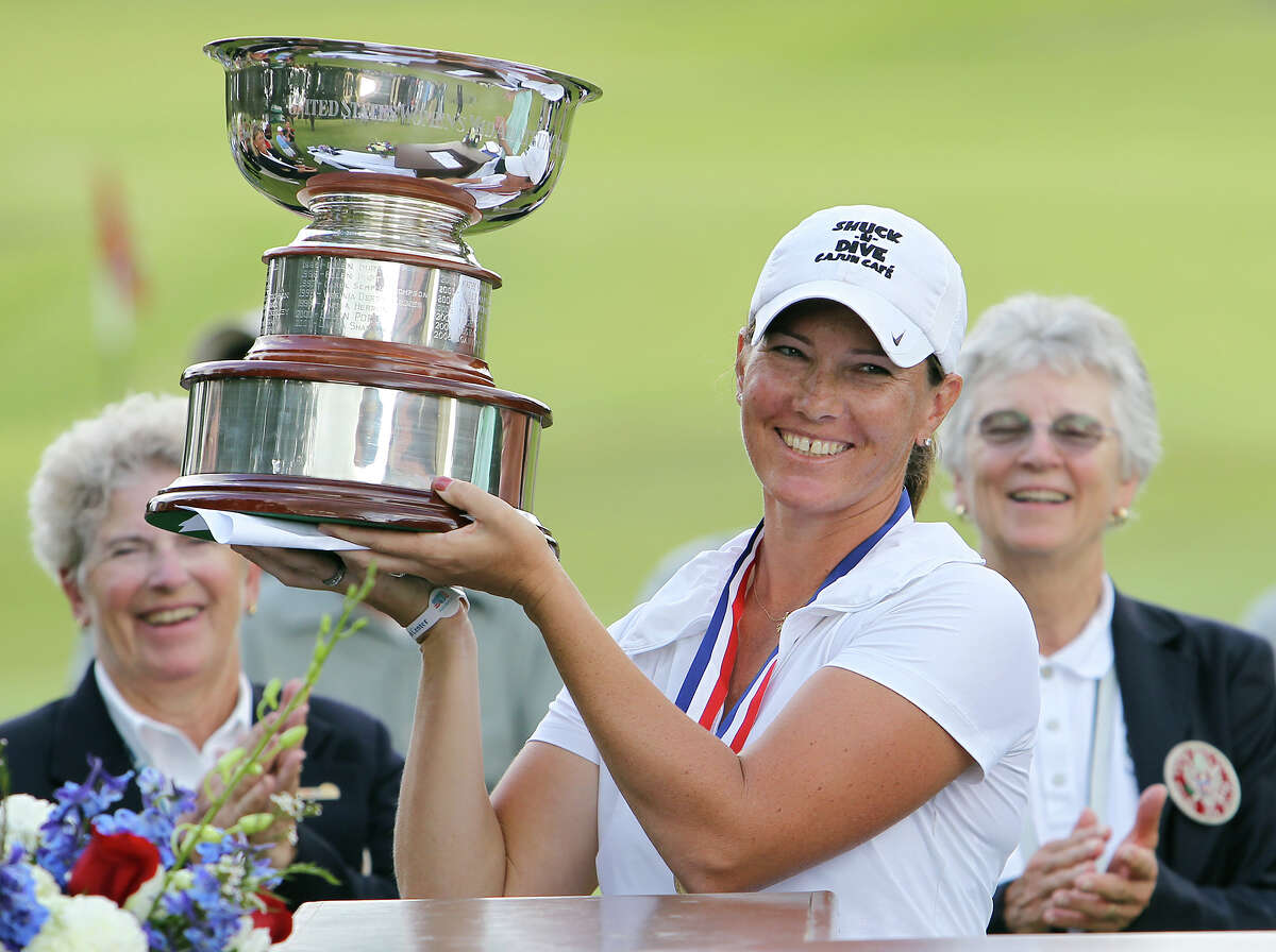 Meghan Stasi of Oakland Park, Florida holds up the winner's trophy after she defeated Liz Waynick of Scottsdale, Arizona, 6&5, at the USGA U.S. Women's Mid-Amateur Championships at Briggs Ranch Golf Club on Thursday, Oct. 11, 2012. Stasi won the title for the fourth time.