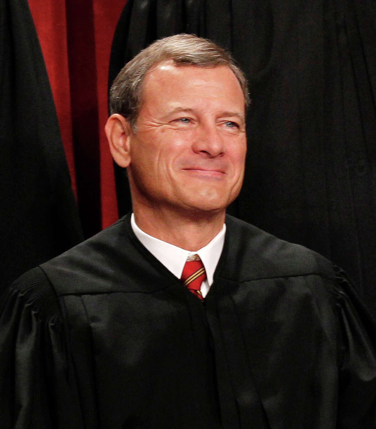 Chief Justice John G. Roberts is seen during the 2010 group portrait at the Supreme Court Building in Washington, D.C.