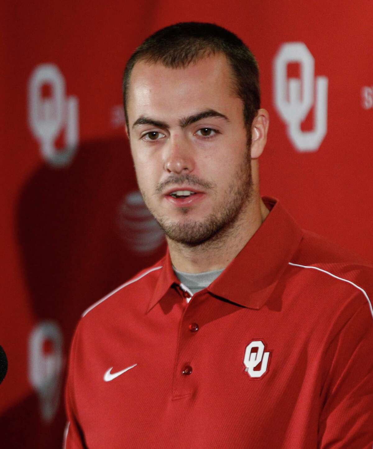 Oklahoma quarterback Landry Jones answers a question during a news conference in Norman, Okla., Monday, Oct. 8, 2012.
