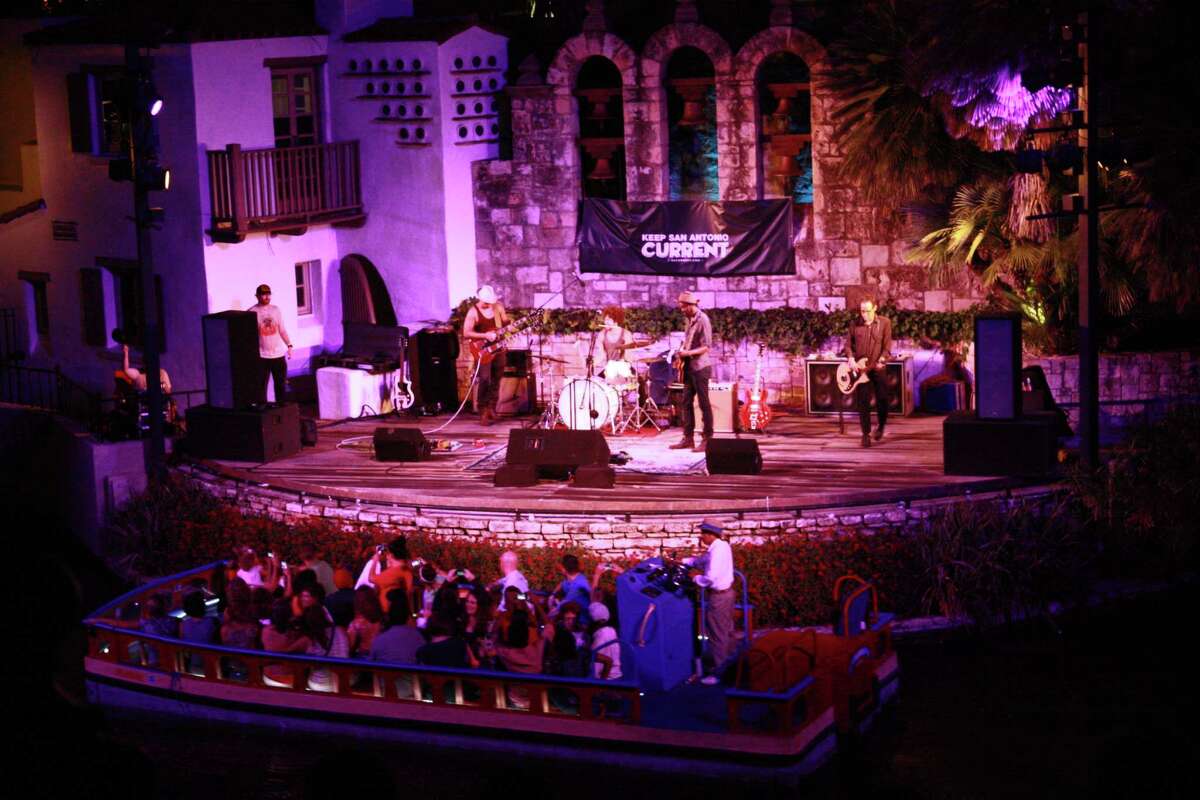 Fans listen to blues singer Gary Clark Jr. perform at the Arneson River Theater on Thursday night, Oct. 11, 2012.