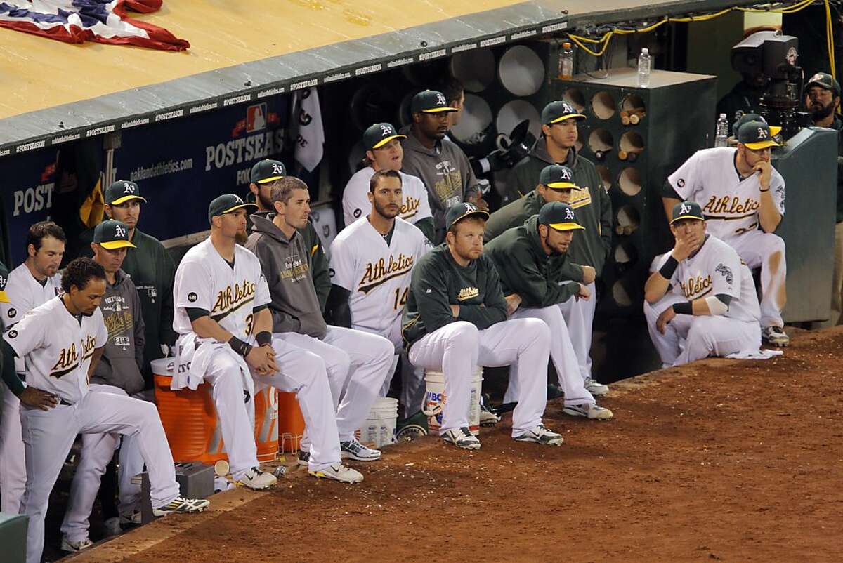 The A's players watch the final outs in the game as the Tigers had too much of a commanding lead heading into the ninth inning. The Oakland Athletics lost 6-0 to the Detroit Tigers in game 5 of the ALDS at O.co Coliseum in Oakland, Calif. on Thursday, October 11, 2012.