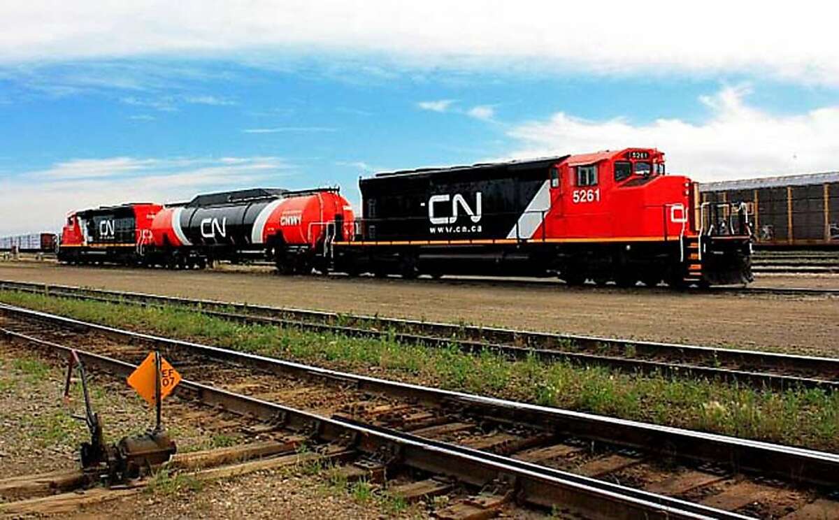 The Canadian National Railway is experimenting with natural gas as a train fuel, which involves adding a liquefied natural gas tank behind the locomotive. (Canadian National Railway photo)