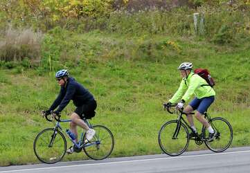 barney riding on a bike