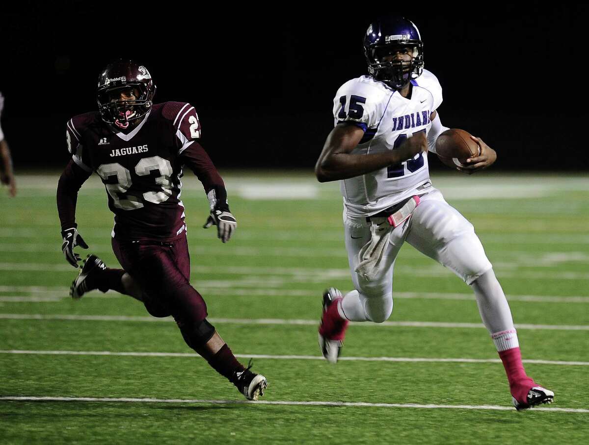 PNG quarterback A.J. Smith runs for a 62 yard touchdown during the Central High School football game against PNG High School at the BISD Thomas Center on Friday, October 5, 2012. Photo taken: Randy Edwards/The Enterprise