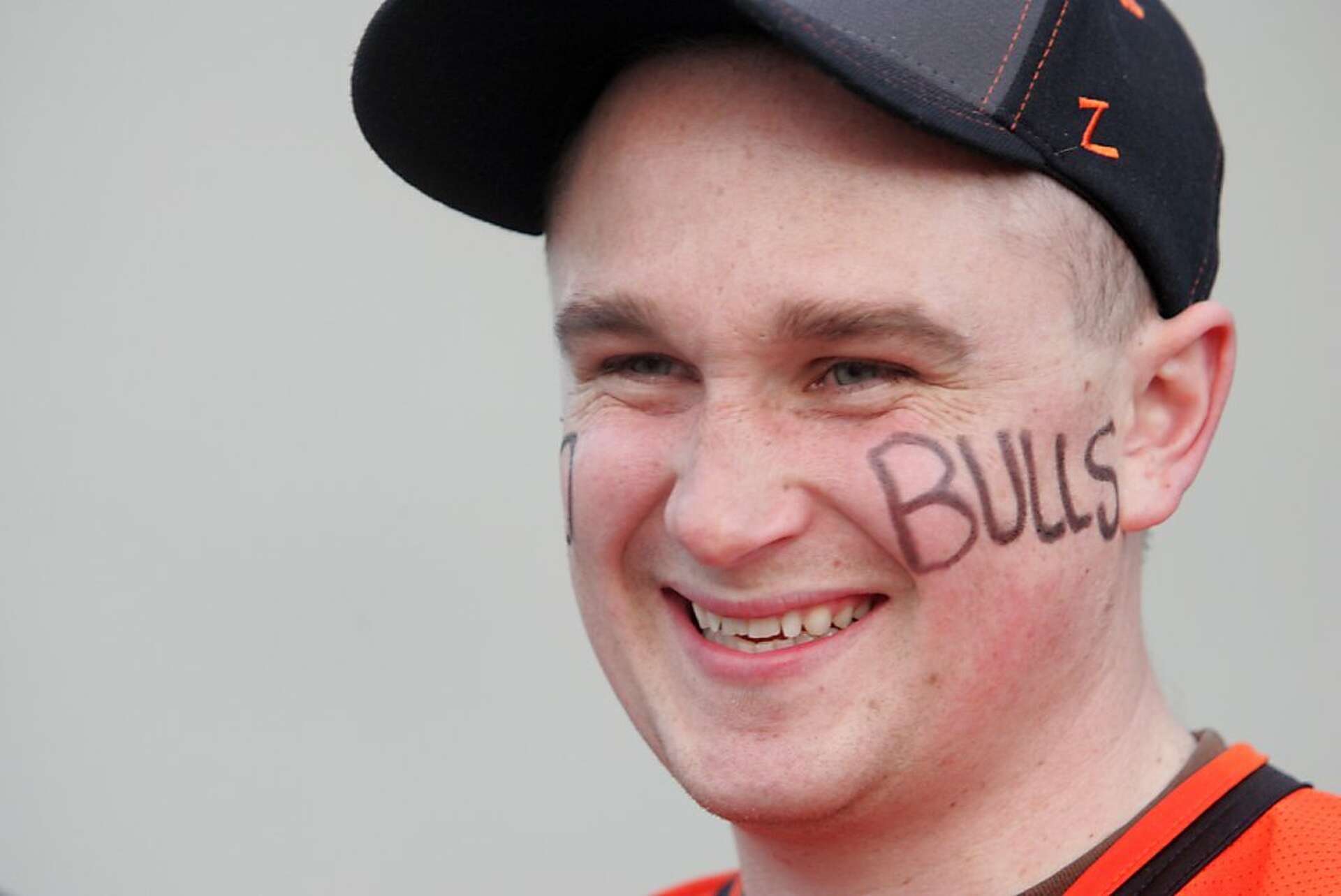 Bulls drop hockey opener before 8,277