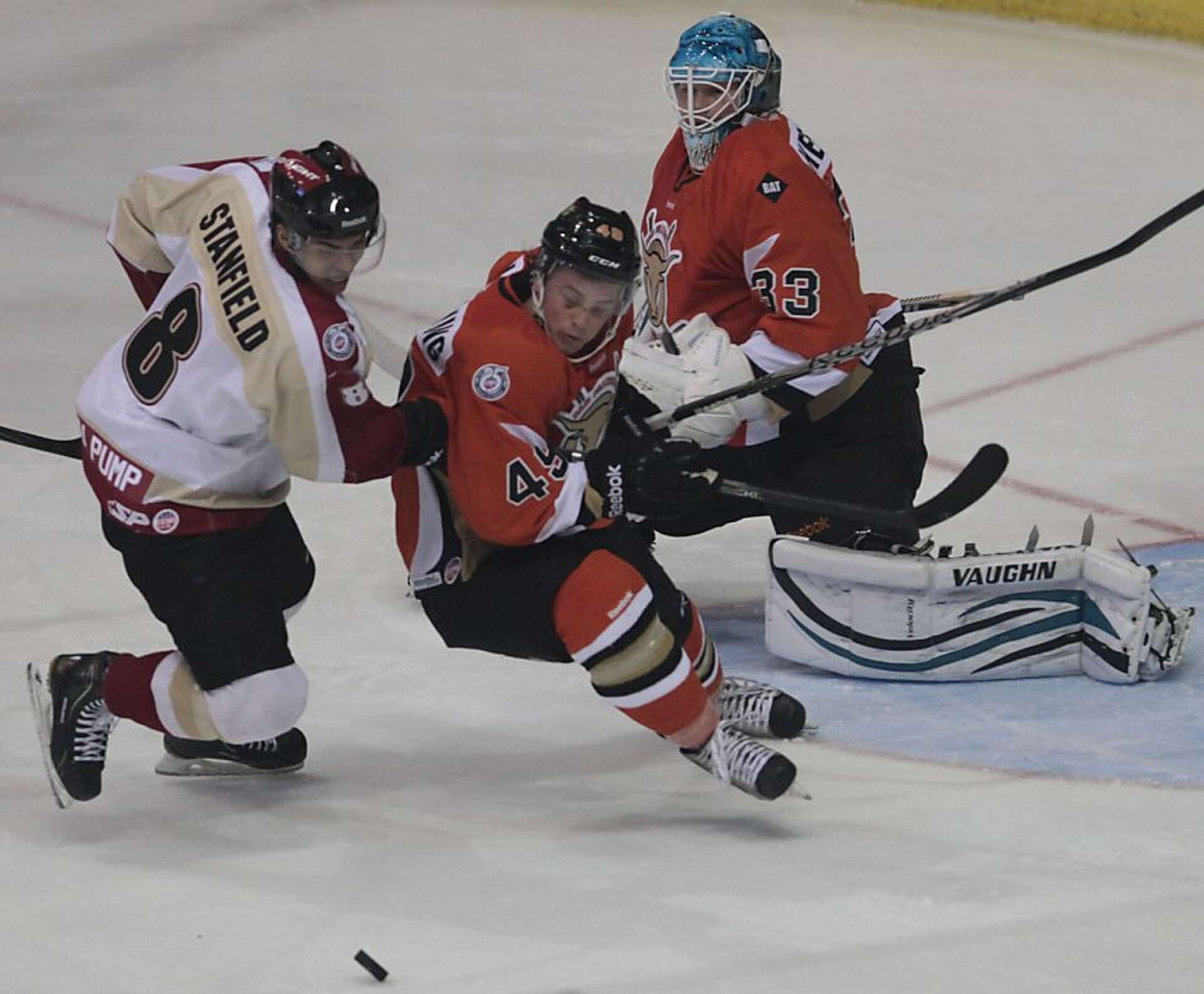 Bulls drop hockey opener before 8,277