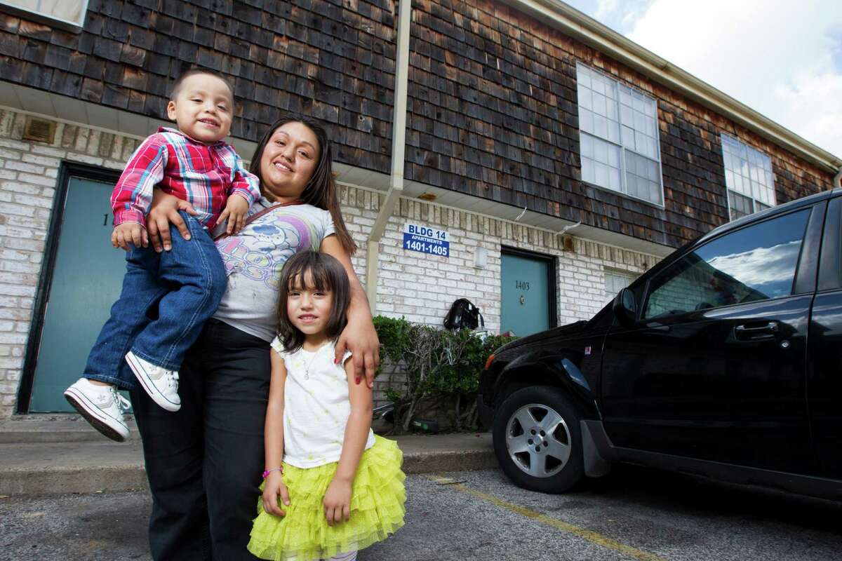 Rosa Rosario and her children - Jessica, 4, and Carlos, 2 - live in an apartment in Gulfton, an area that serves as a gateway to immigrants in Houston.