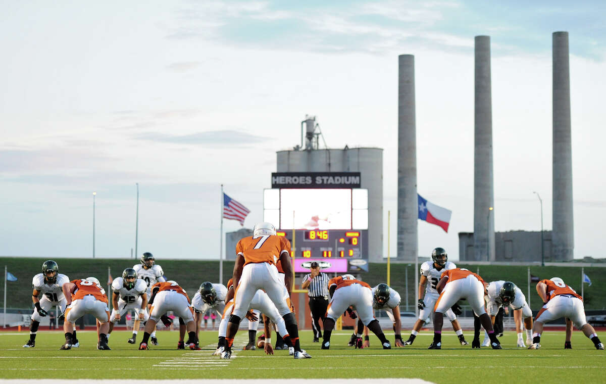 The old Longhorn Quarry serves a backdrop during a 26-5A Football game between the Reagan Rattlers and the Madison Mavericks at Heroes Stadium in San Antonio, Saturday, October 13, 2012. John Albright / Special to the Express-News.