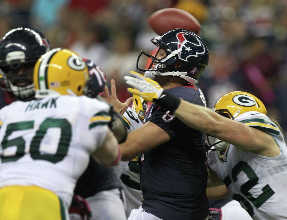 Houston Texans quarterback Matt Schaub (8) gets off a pass as he is hit by Green Bay Packers outside linebacker Clay Matthews (52) during the fourth quarter at Reliant Stadium, Sunday, Oct. 14, 2012, in Houston.