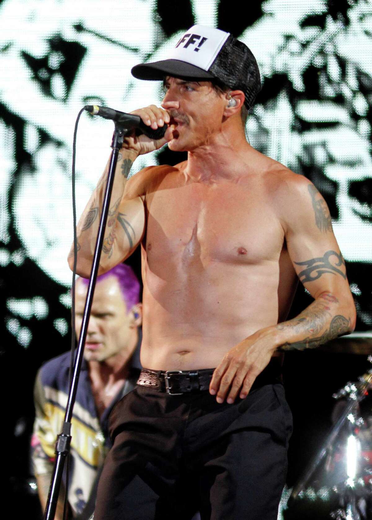 The Red Hot Chili Peppers perform at the Austin City Limits Music Festival, Sunday, Oct. 14, 2012, in Austin, Texas.(Photo by Jack Plunkett/Invision/AP)