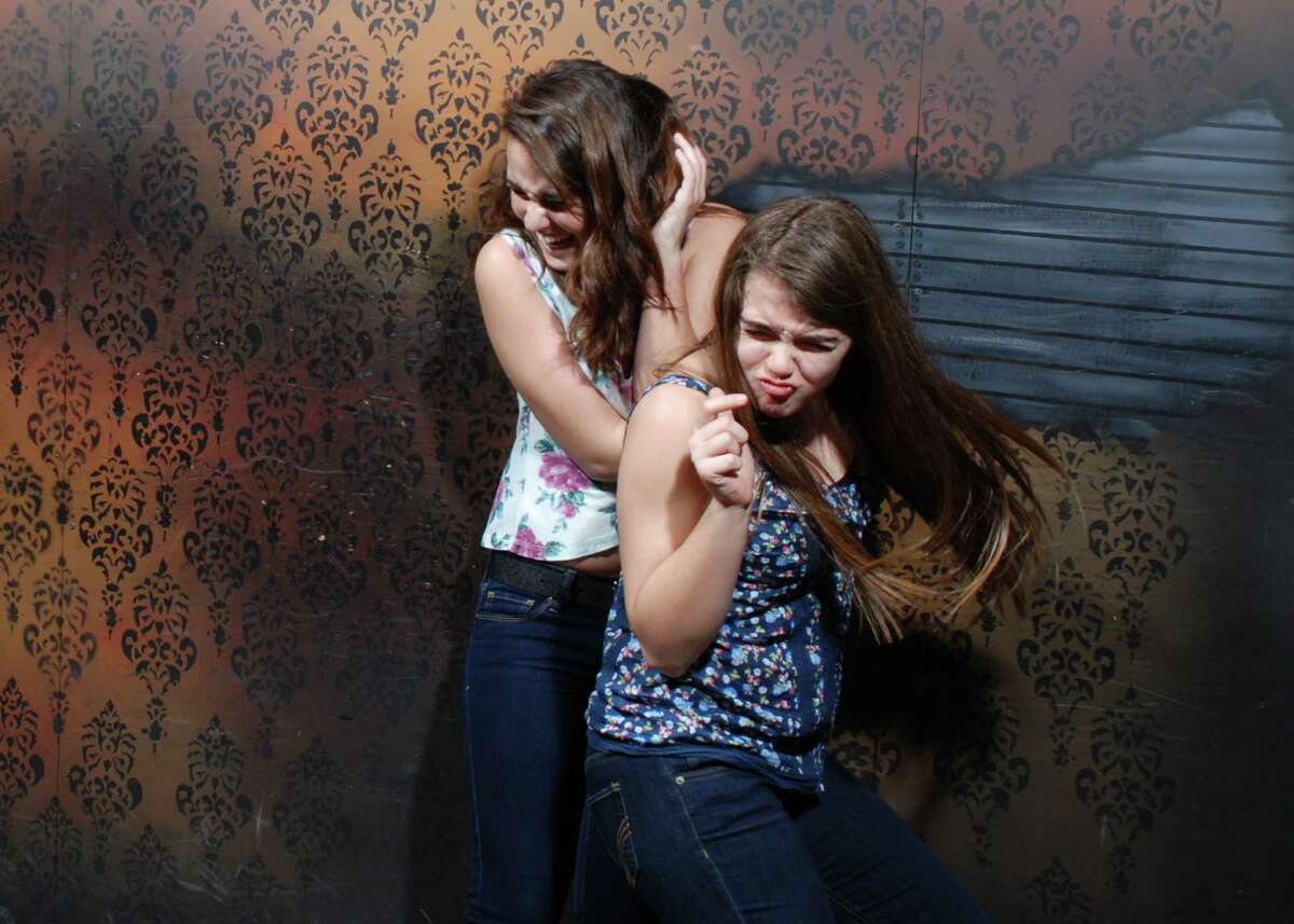 See patrons scream in horror as they have their pictures taken by surprise at Nightmares Fear Factory in Niagara Falls, Ontario, Canada. Visit: www.NightmaresFearFactory.com