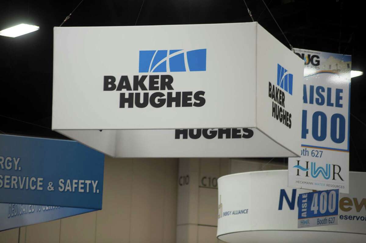 Baker Hughes Inc. signage is displayed at the DUG Eagle Ford Conference & Exhibition in San Antonio, Texas, U.S., on Monday, Oct. 15, 2012. Marathon Oil Corp., the U.S. oil and natural gas producer that spun off its refining business last year, is seeking to sell more than 96,000 net acres in the Eagle Ford formation in Texas. Photographer: Eddie Seal/Bloomberg