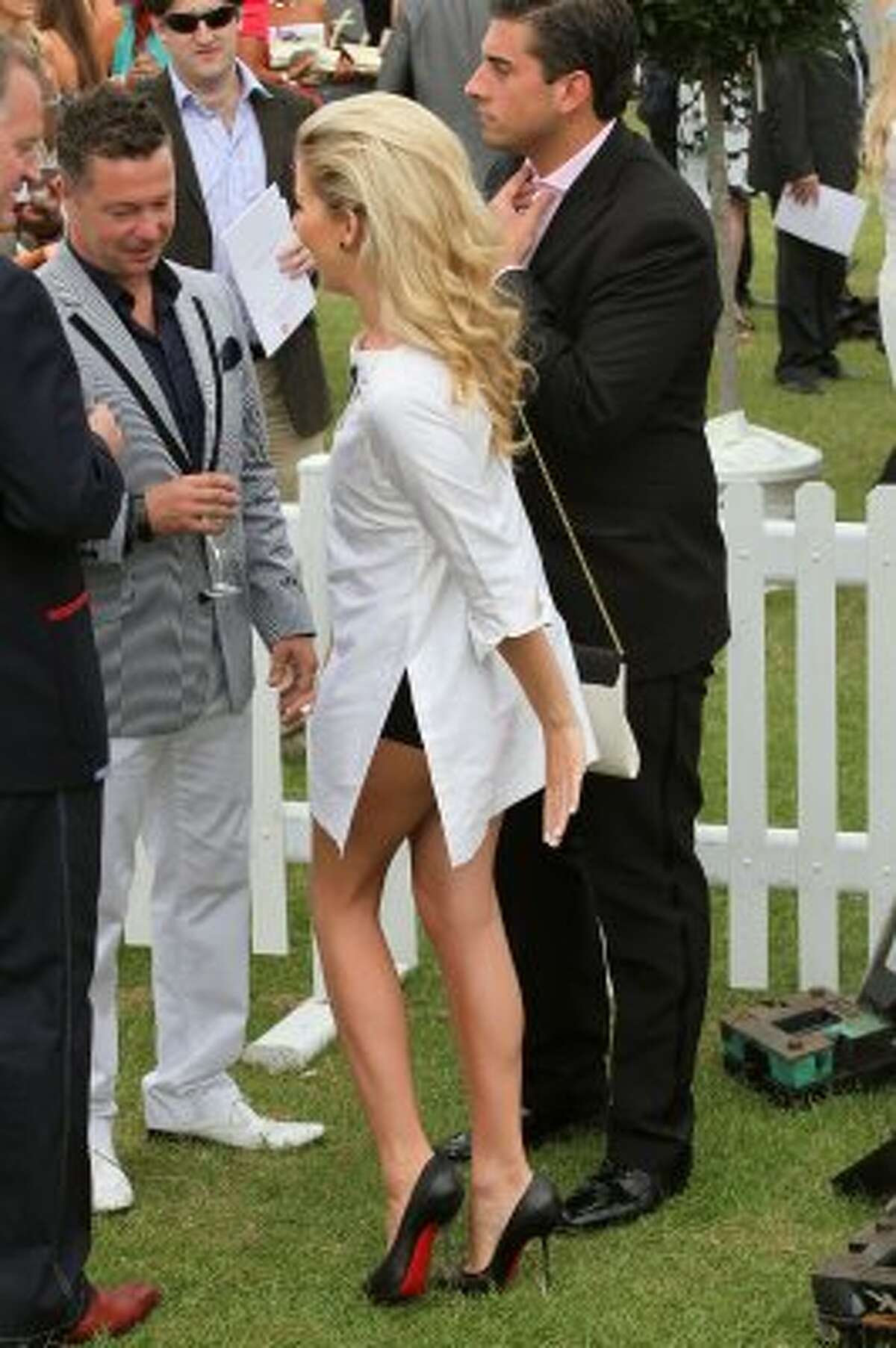 Definitely shoulda worn pants. (Lydia Bright at The Duke of Essex Polo on July 9, 2011). (Neil Mockford / Getty Images)