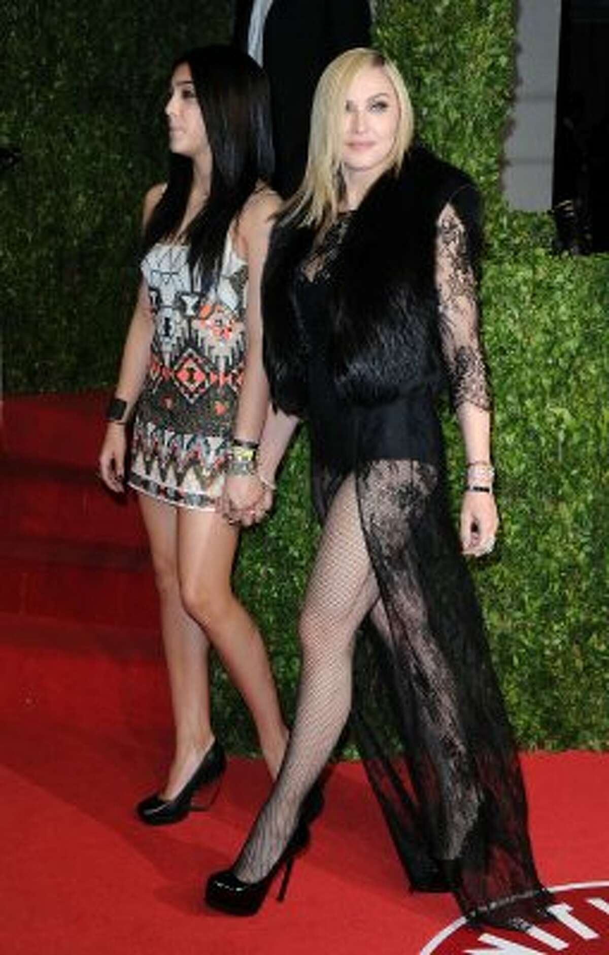 Madonna's, of course. She went leggy and sheer at Vanity Fair Oscar party in 2011. She's pictured here with daughter Lourdes Leon. (Pascal Le Segretain / Getty Images)