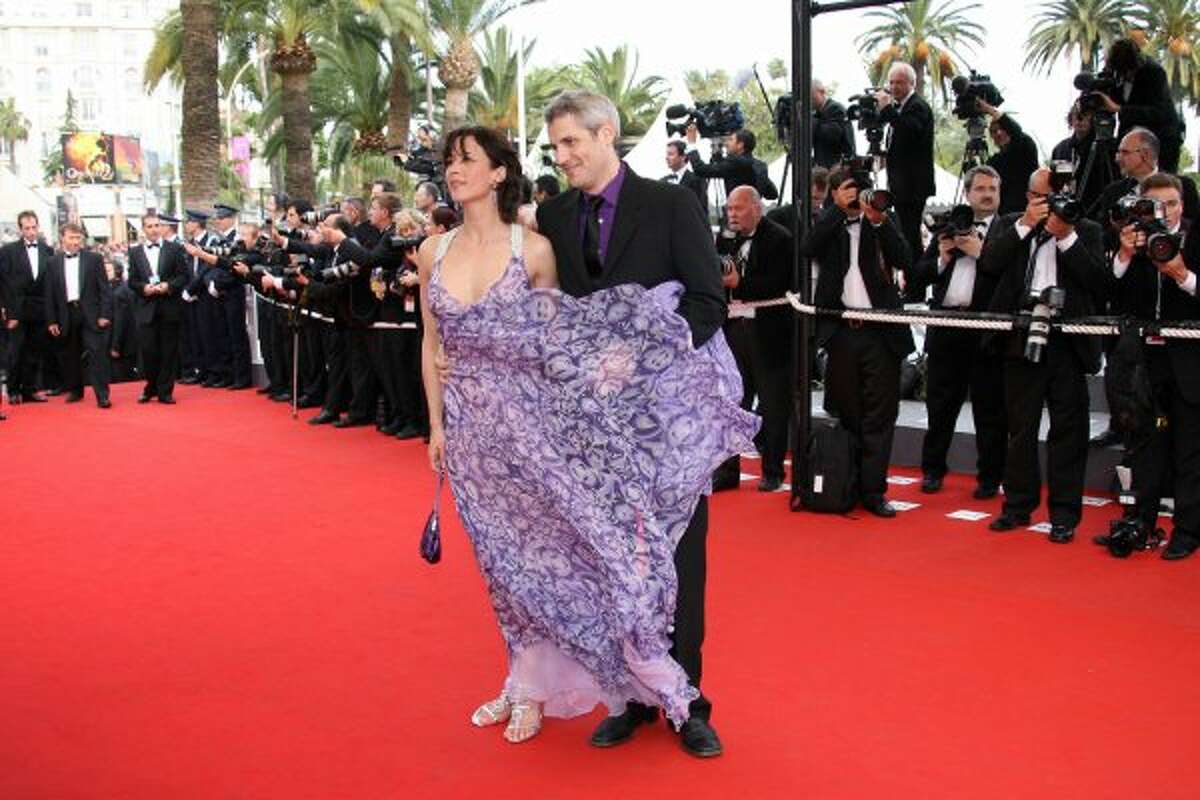 Floaty dress and windy conditions wreak havoc on French actress Sophie Marceau's red carpet pose. (VALERY HACHE / AFP/Getty Images)