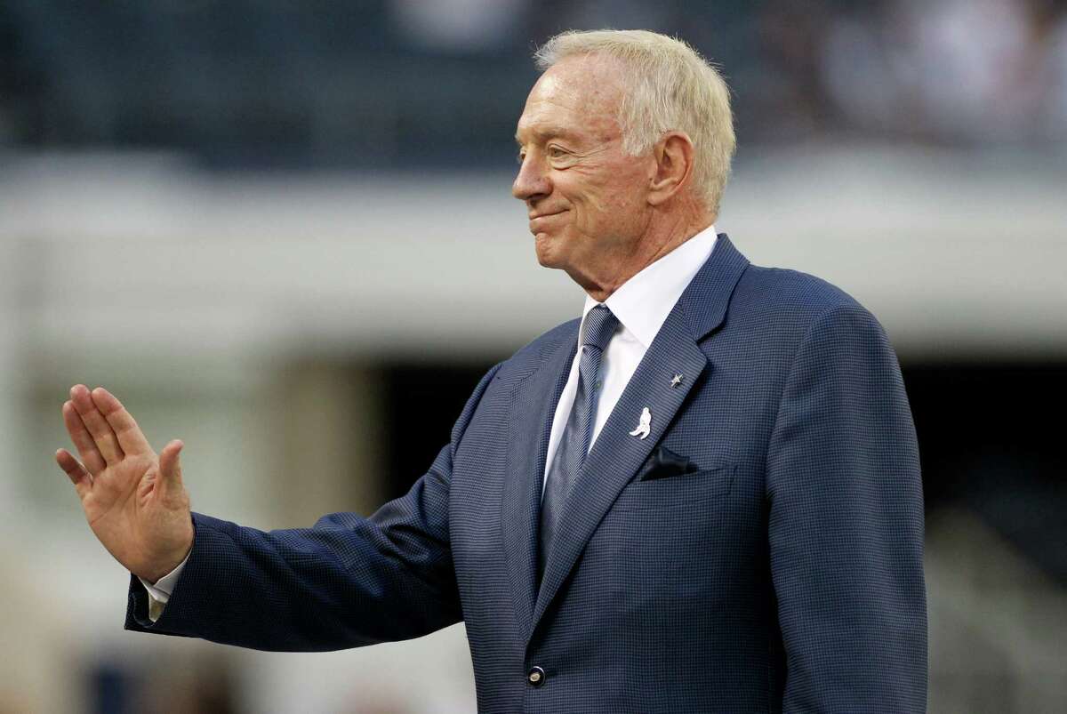 Dallas Cowboys team owner Jerry Jones on the field before an NFL football g...