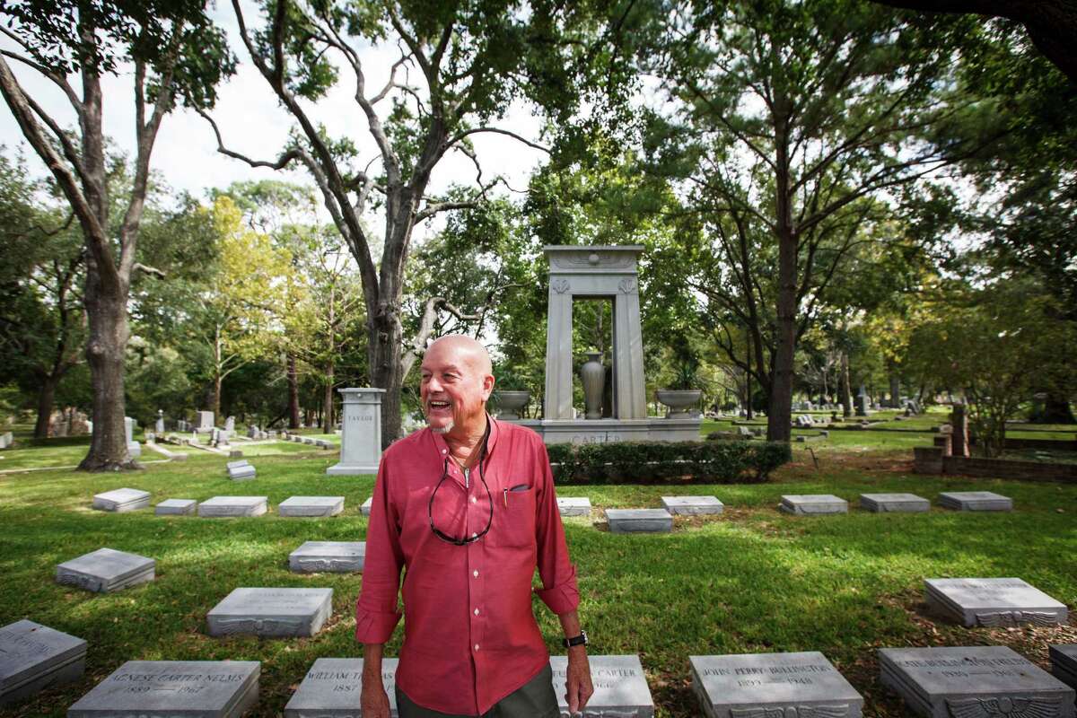 Marks Hinton, author and expert of Houston's cemeteries, stands at the Glenwood Cemetary, Tuesday, Oct. 9, 2012, in Houston. Hinton will lead a tour of historic burying grounds visiting the final resting places of some of the city's most famous and infamous forefathers including philanthropist George Herman, Reverend Jack Yates, entrepreneur Howard Hughes and movie star Gene Tierney. ( Michael Paulsen / Houston Chronicle )