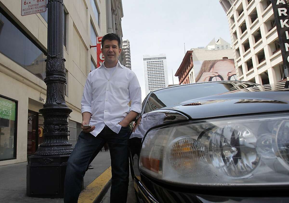 CEO of Uber Travis Kalanick with one of the car Uber service uses to drive customers in San Francisco, Calif. on May 1, 2012.