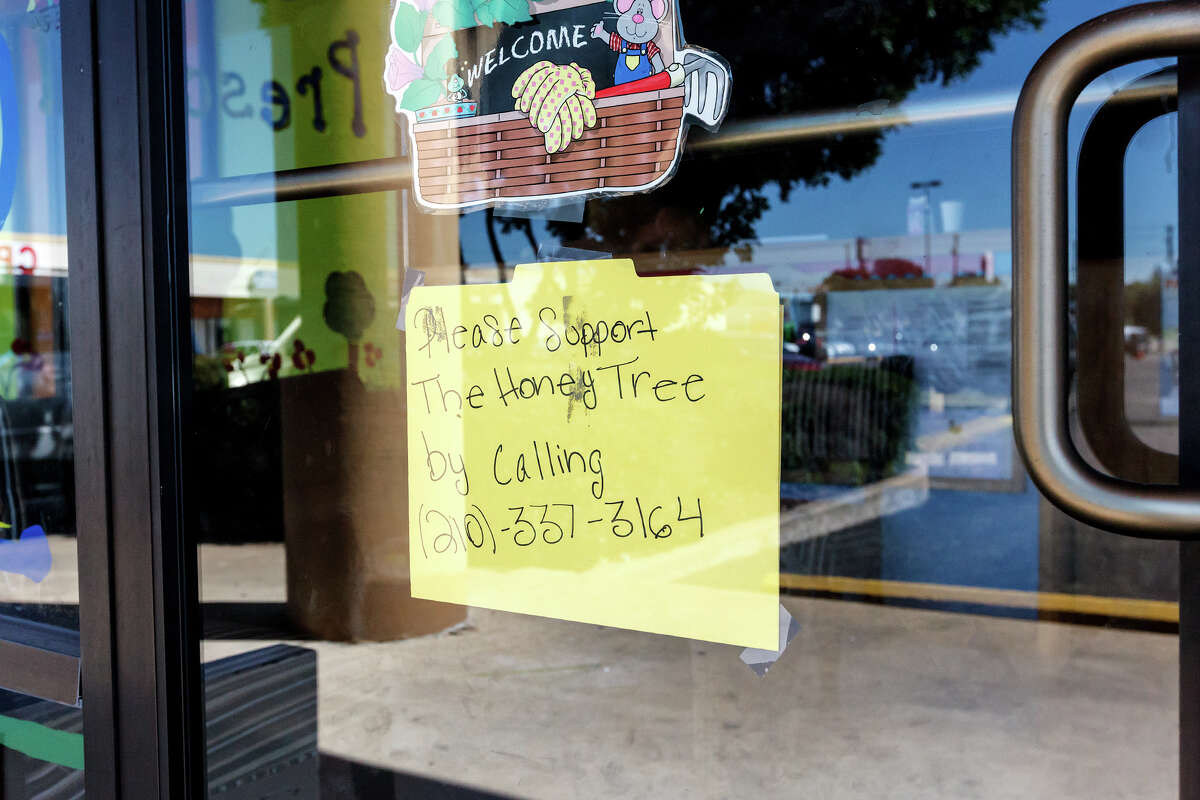This sign taped to the front door seeks support for the Honey Tree Pre-school and Child Development Center on Culebra Road.